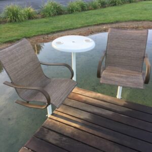 Wooden deck with chairs and table