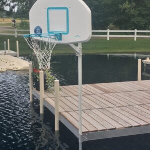 Lakeside basketball setup on a wooden dock