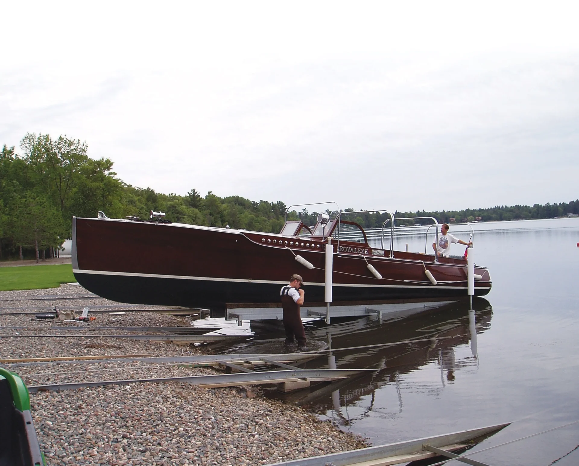 Wooden boat on a lakeside ramp
